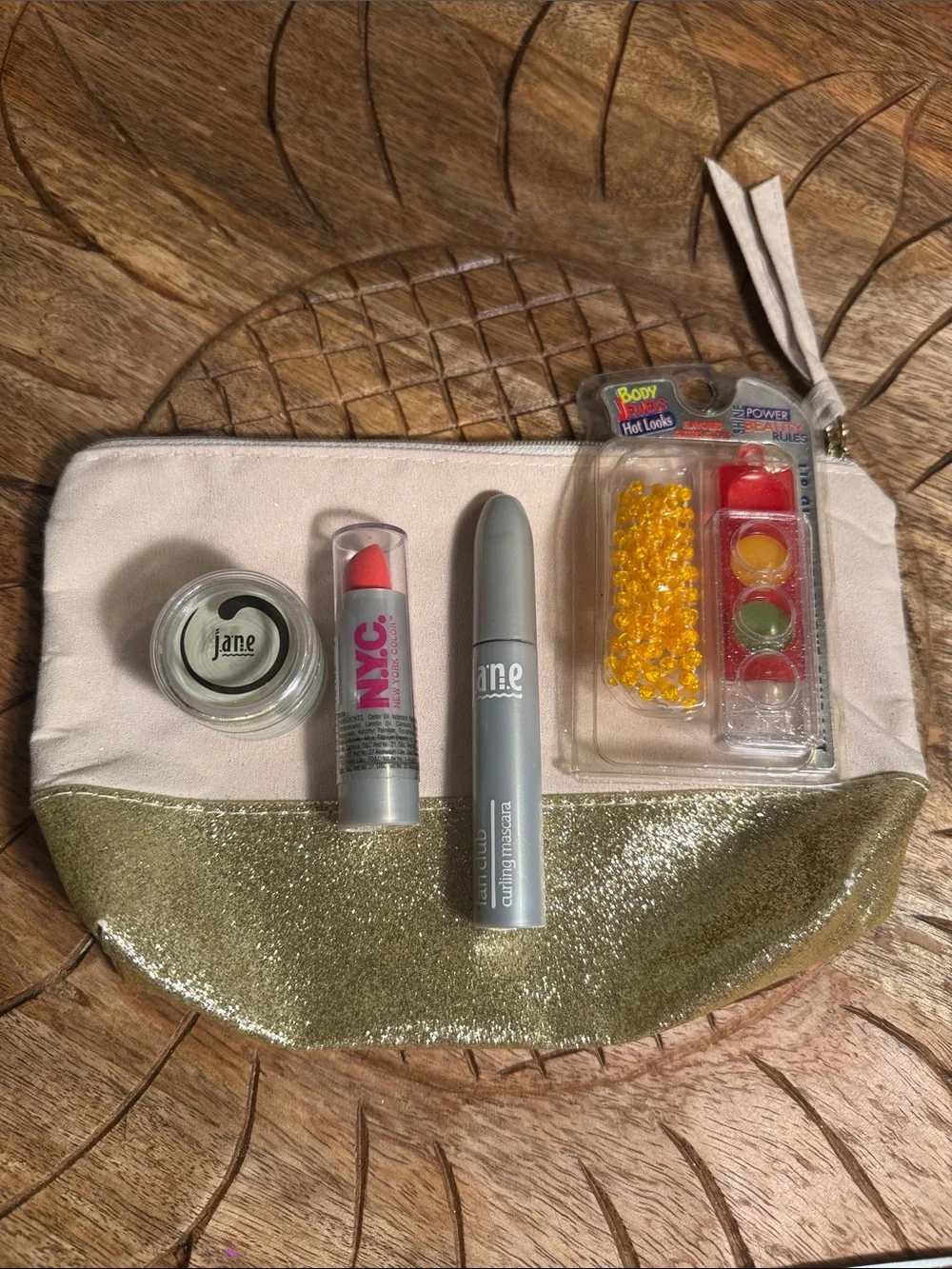 NWT Jane mascara with gold-accent glitter makeup pouch and assorted lipsticks